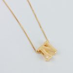 20500-site---colar-letra-ouro-18k-N