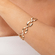 33460-pulseira-correntaria-elos-entremeio-cravejado-banho-ouro-rosa-valverde-semijoias.png