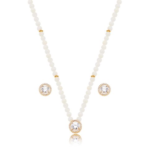 40316-conjunto-redondo-cravejado-pedra-banho-ouro-18k-madreperola-e-cristal-rosa-valverde-semijoias